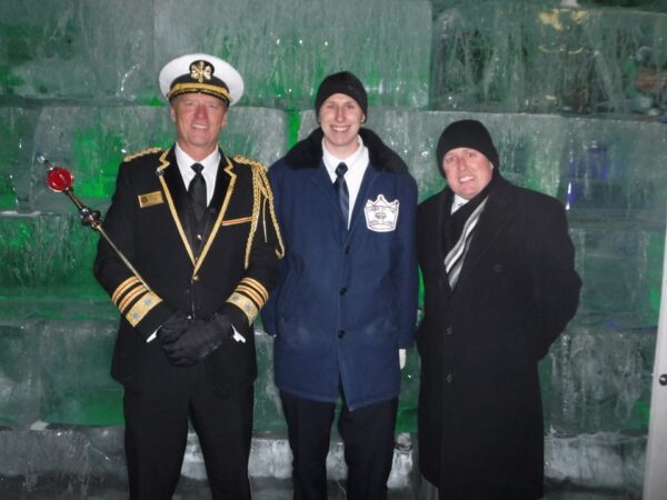 Photo of King Boreas LXXXII, Royal Guardsman Danny and Neighbors CEO Charlie Thompson. Danny spent the night in the Ice Palace to raise awareness for the need for cold weather gear donations.
